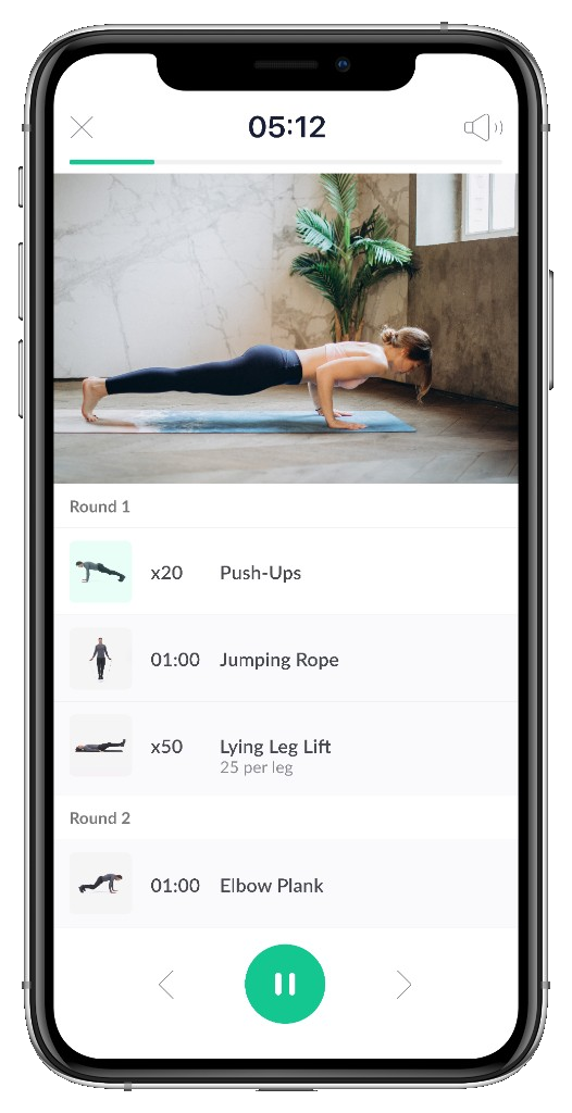 Traen fitness app on iPhone: active workout with timer, exercise list, and video